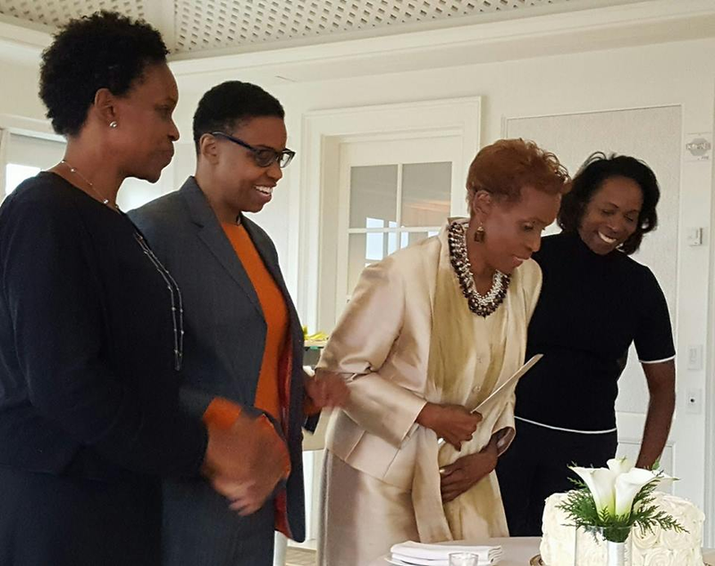Dorothy Gilliam, the first African American female reporter in the Washington Post newsroom, celebrates her 80th birthday Monday at a party given by her daughters, Melissa, left, Leah and Stephanie. The event, attended by about 60 people, took place at the Hay-Adams hotel overlooking the White House. Gilliam was a Post editor and columnist, co-founder of the Maynard Institute for Journalism Education and president of the National Association of Black Journalists. (Credit: Mary Layton)